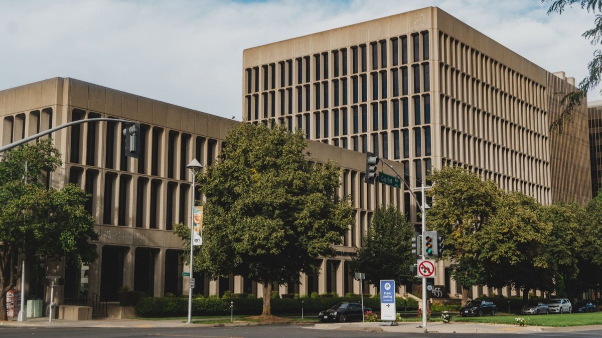 Government office with electric vehicle incentives signs