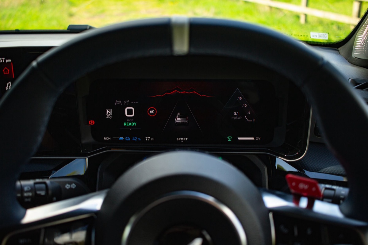 A digital dashboard showing a high battery percentage and range indicator.