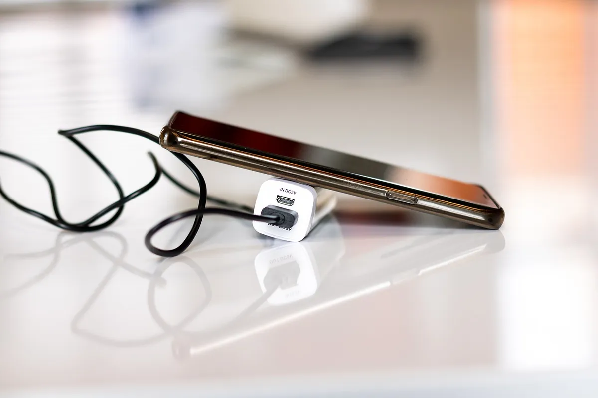 charging phone, power bank, charger, charge, battery, cable, energy, smartphone, powerbank, cellphone, device, electric, equipment, gadget, mobile, phone, power